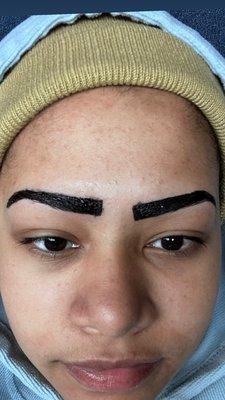 The eyebrow on the right way is way lower.