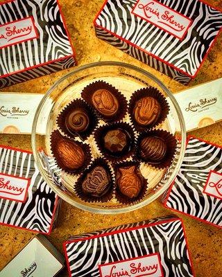 Sweet Somethings! Add a Tin of Louis Sherry Chocolates. Available in 2 piece, 12 piece & 24 piece