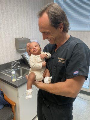 Dr. Marinescu saved our lives 6 weeks ago. He even shared words of wisdom to baby Judah at this visit.