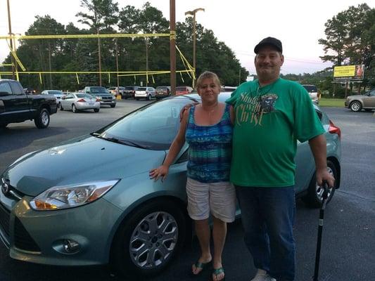 Congratulations to this couple and their new 2012 Ford Focus