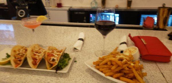 Shrimp Tacos, Truffle Parmesan Fries, Red Blend Wine and I have no idea my BFF drink was.