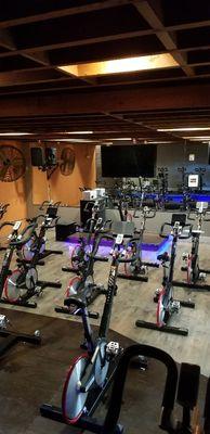 Our premium group cycling room, fully equipped with Keiser stationary bikes and a surround sound system.