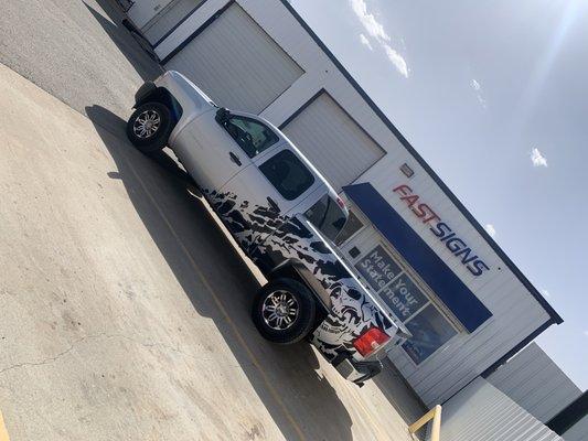 New vinyl on my truck. Parked outside of Fastsigns who put it on.