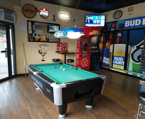 Game Room includes pool table, dart board, Golden Tee Golf and oversized connect 4 board