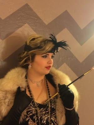 1920's themed hairstyle and makeup for a party.