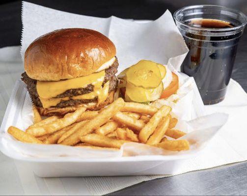 Our double cheese burger 1/2 in each party for only $8.99 plus tax served with fries and a drink