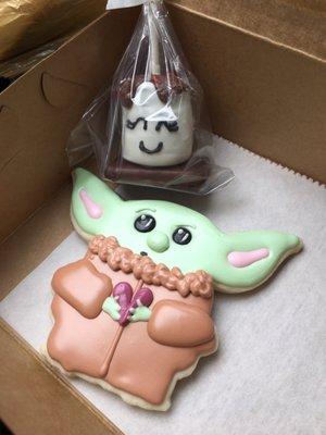 Baby Yoda valentine cookie and a s'mores cake pop.