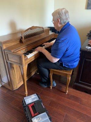 Jack playing his "check-it outer" song after tuning.