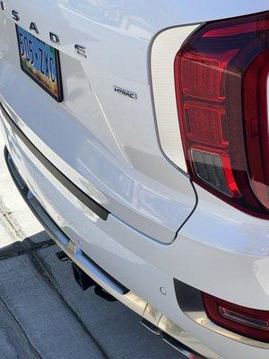 Bad color match. Bad fit. Curve at bottom of tailgate doesn't match the bumper curve.