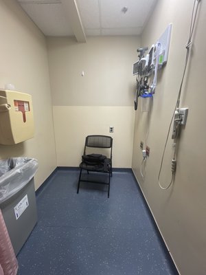 My treatment room in the ER. Single chair no arm rests