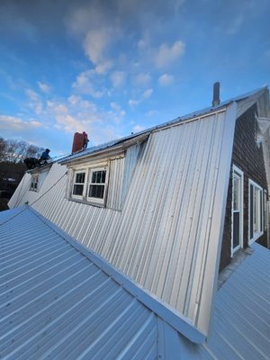 In progress corrugated metal roof.