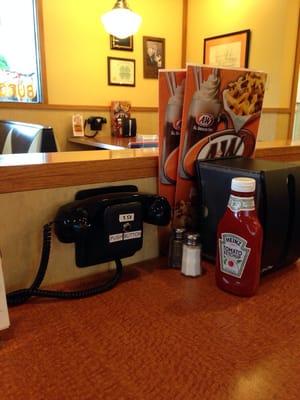 Way cool! Phone in your order from your table when you're ready!!!