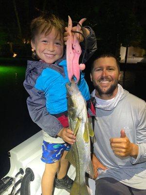 Braxton & Capt Chris with Braxton first Snook!