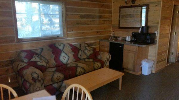 Couch, kitchen table/chairs cabin 212