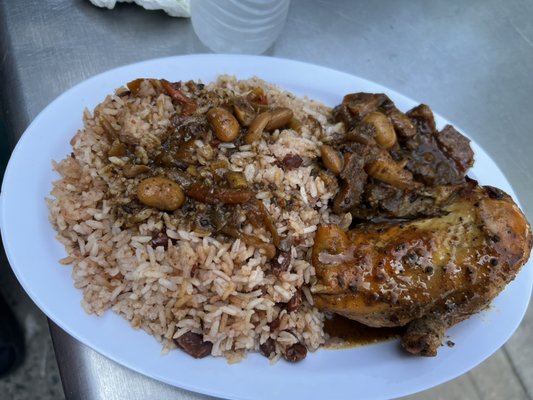 Jerk chicken and rice and peas with oxtail gravy.