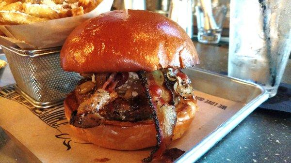 Black N' Bleu Burger with crumbled Bleu cheese, smoked pepper bacon, and carmelize onions. 4/5. Solid Chuck biscuit on brioche bun.