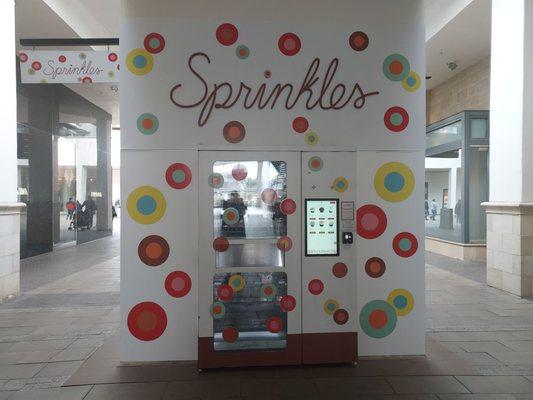 Sprinkles vending machine near CPK and other restaurants