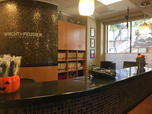 Organized front desk and reception area.