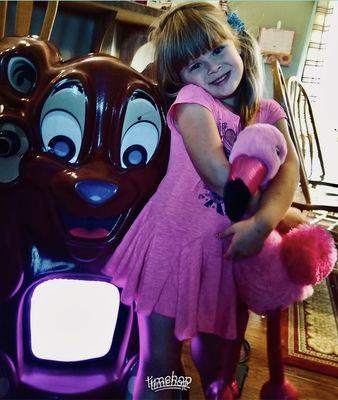 My stuffing machine "Sammy the Bear" along side my daughter and her new flamingo stuffy!