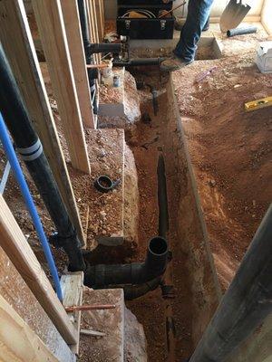 Another picture of basement toilet and sink.