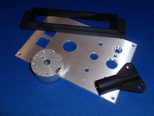 Machined plastics & metals, CNC, Milling, Machining, Boring, Reaming, ETC.  http://www.mcmachineinc.com/cnc_machining.html