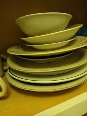 Chipped plates and bowls.