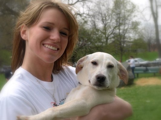 Our lovely receptionist, Kaite Fox, with her puppy, Felon.