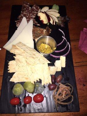 Charcuterie comes with 3 item choices cheeses meats, then extra for each added item.  This photo is 4 items