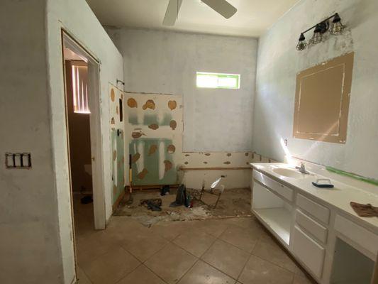 Before (After Demo): there was a 36" shower on the left, and 6' tub on the right.