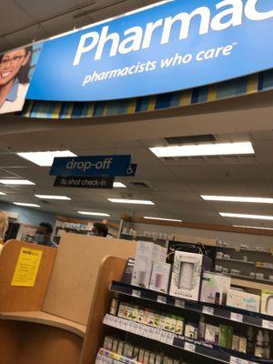 At the pharmacy for a flu shot.