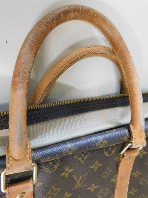 Handles on a Louis Vuitton suitcase before....