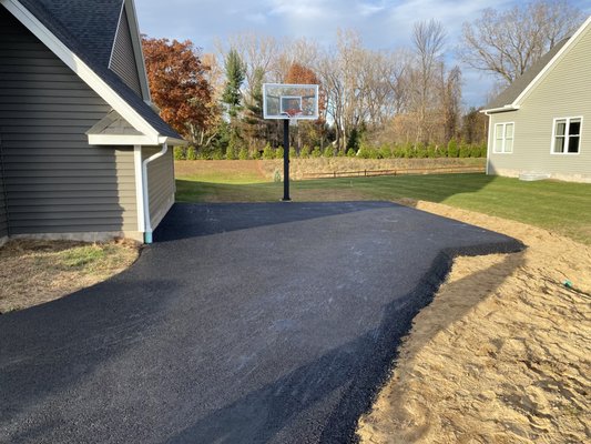 Purchasing a basketball hoop? Let us take care of the install for you. We also installed this beautiful asphalt court!