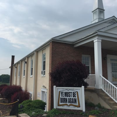 While driving home from working on a property, I noticed this beautiful church with many missing shingles...