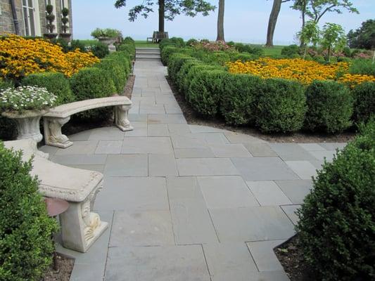 This Historic Formal boxwood garden feature bluestone walks and perennials for color.