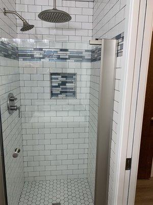 Tiled shower after pulling out old shower stall