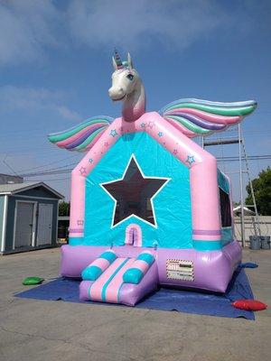 Glittery Unicorn Bounce House with 3D unicorn head and wings. Rental in Los Angeles.