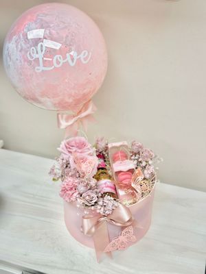 Pink Blooms with Macaroons and Mini Champagne