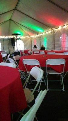 20x60 Frame Tent with Can Lights, Round Tables w/ Red Linens and White Samsonite Folding Chairs