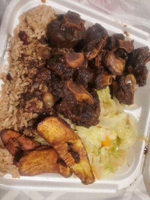 Oxtails Fried Plantains Rice & Peas Steamed Vegetables