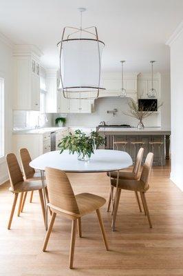 A clean and contemporary kitchen with a family-friendly eat-in dining area.