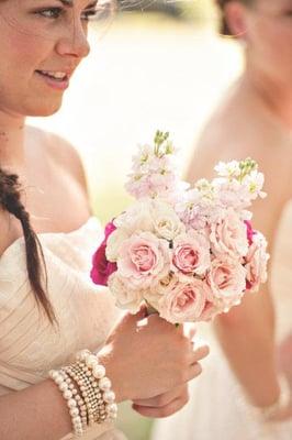 bridesmaids bouquets of spray roses and stock