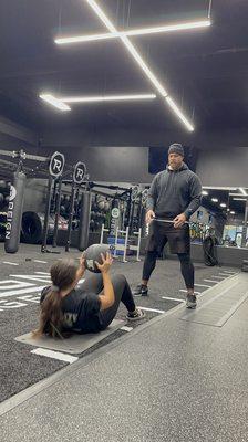 Personal trainer, Tait Afualo, training a high school waterpolo student-athlete.