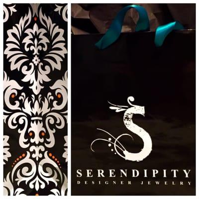 Love the elegant black & white colors on their gift bags!