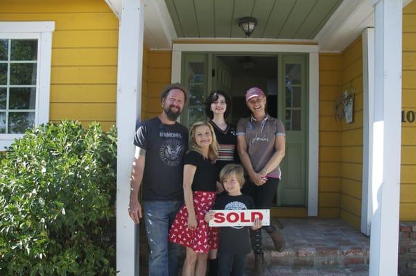 My happy buyers AND sellers celebrating their closing.  Bust open the champagne!