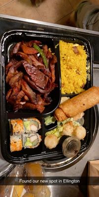 Spare rib box dinner  Sides: fried rice and egg roll Comes with 4 pieces of California roll and 4 pieces of shumai