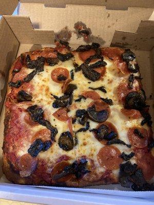 Personal pepperoni and mushroom pizza