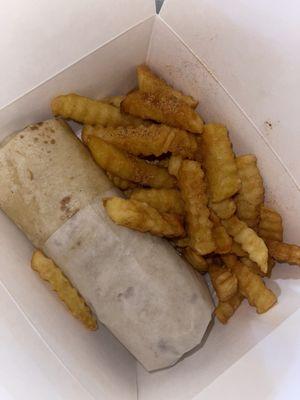 From flavor house grill: The oxtail & plantain wrap with fries