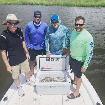 The Hart family. Box of Trout, Redfish and Sheepshead!