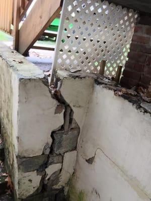 Wall at basement entry in disrepair