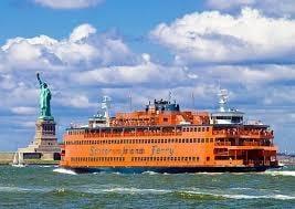 The Staten Island Ferry as it passes the iconic Statue of Liberty.